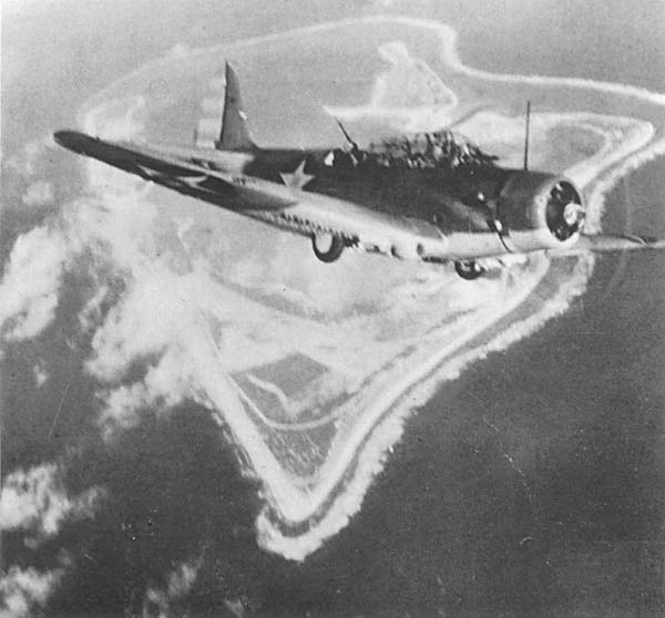 An Enterprise CV-6 torpedo bomber over Wake Island, 24 February 1942.