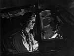 Torpedo 90 pilot, LT(jg) William L. Cromley, in plane, January 1945.