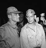 Admiral Marc Mitscher (left) and staff on Enterprise CV-6, 11 May 1945.