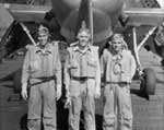 LT(jg) Ralph W. Cummings (center) and his VT-10 air crew, in spring 1944.