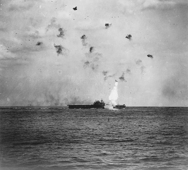 The Big E's Number One elevator is blasted skyward by a Kamikaze hit, May 14, 1945.