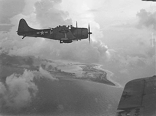 US Navy SBD dive-bombers over Wake Island, October 1943.