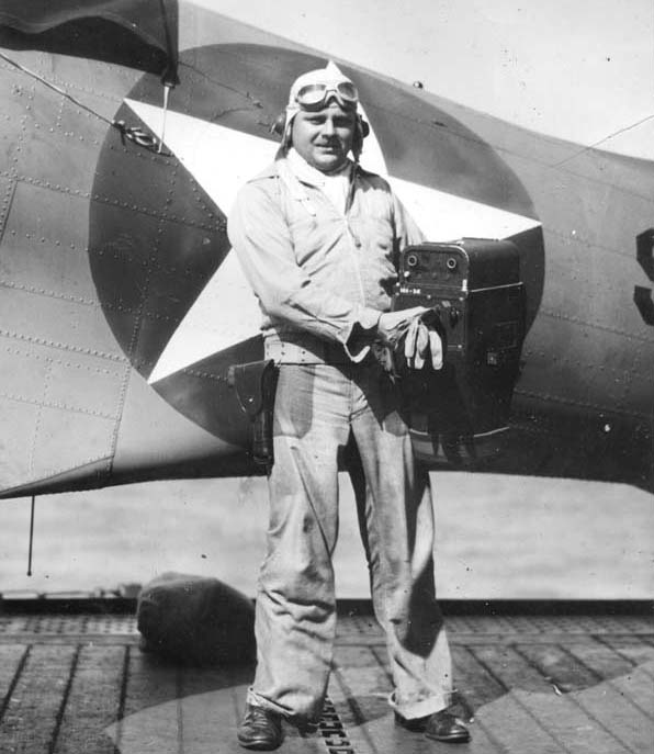 Photographer's Mate Marion L. Riley, at the time he served in Fighting Squadron Six.