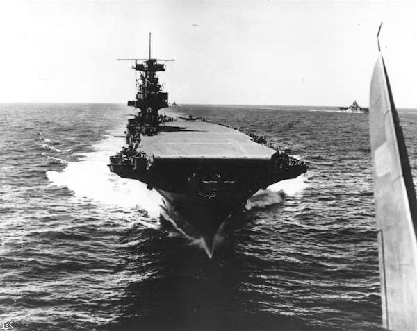 A classic image of the Big E, as seen from a Dauntless dive-bomber just launched from her deck.